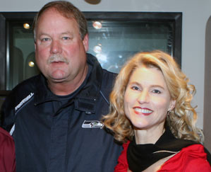 Heather Bosch with Mike Holmgren at KIRO Radio studios in Seattle when Holmgren was the Seahawks' coach -- between 1999 to 2008.