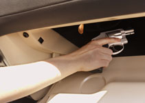 Concealed weapon in a car glove compartment