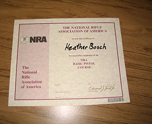 Heather Bosch gets NRA certified to shoot a weapon.