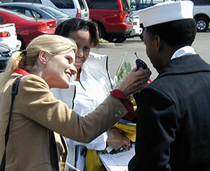 Heather Bosch covering the return of the U.S.S. Lincoln after the Iraq War