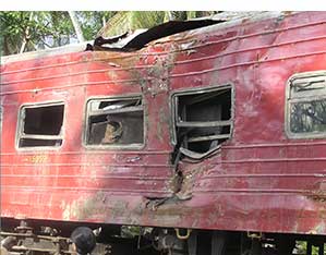Wreckage of a train hit by a tsunami in Sri Lanka in 2004